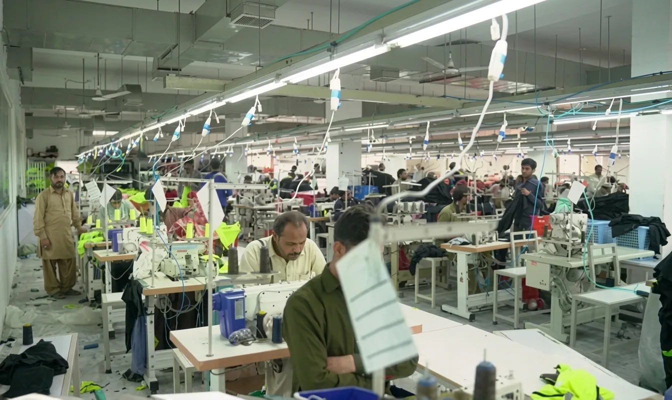 Machine operators at work on the production floor